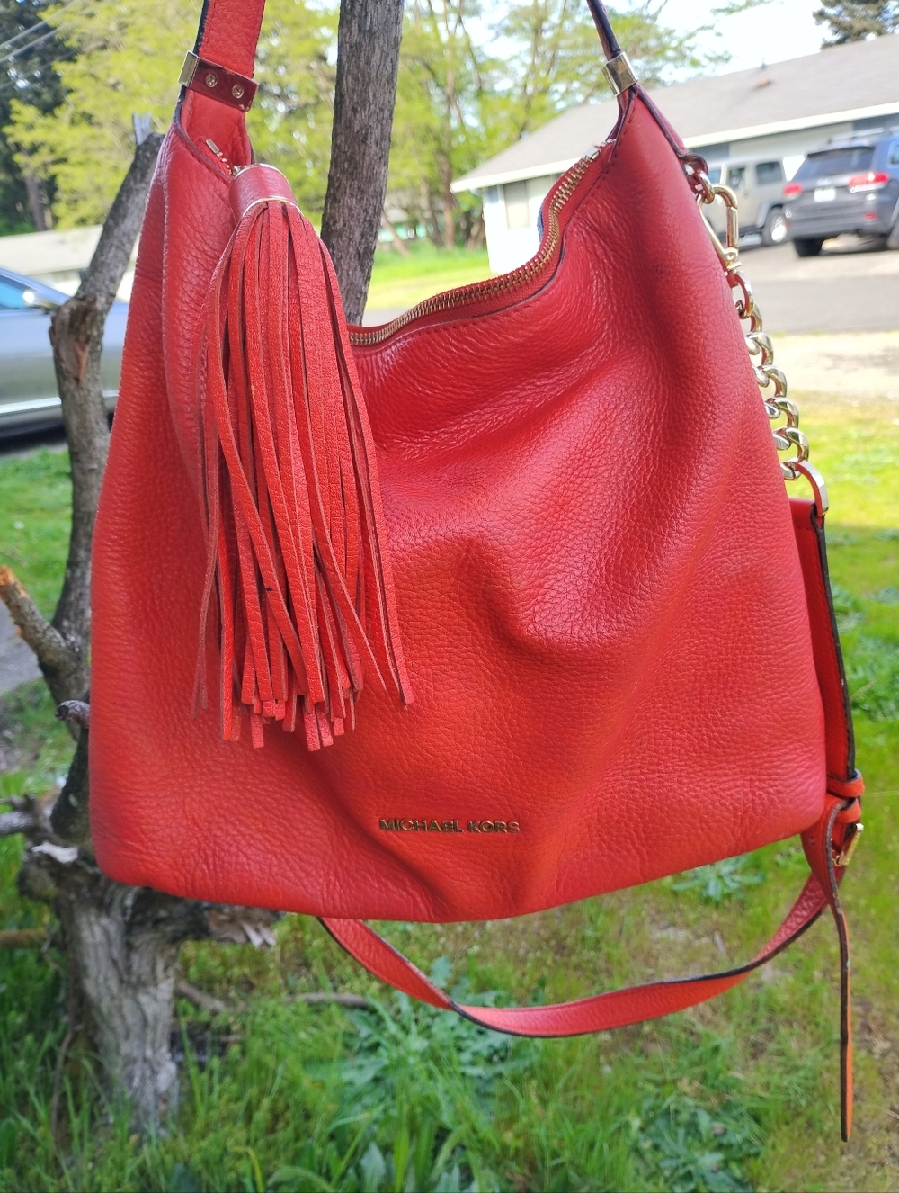 Michael Kors Red Pebbled Leather Tassel Hobo Bag